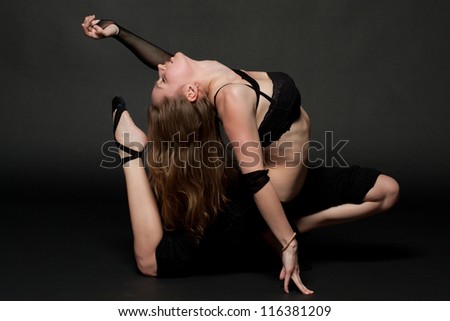 Young woman practicing Yoga exercises. Yoga and fitness.
