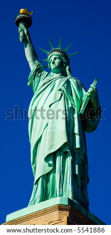 Full Image of Statue of Liberty against a Blue Sky