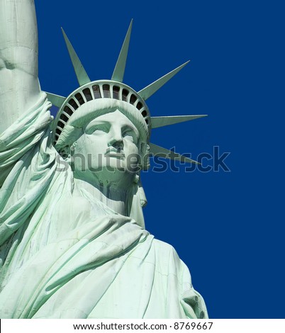 Close-Up of Statue of Liberty against a clear blue sky.