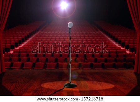 Microphone On Stage With Empty Seats