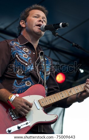 TOOWOOMBA, AUSTRALIA - MARCH 20: Troy Cassar-Daley plays at the \'Spirit of the Country\' flood relief country music concert on March 20, 2011 in Toowoomba, Australia.