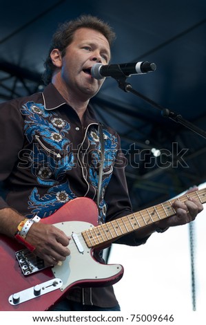TOOWOOMBA, AUSTRALIA - MARCH 20: Troy Cassar-Daley plays at the \'Spirit of the Country\' flood relief country music concert on March 20, 2011 in Toowoomba, Australia.