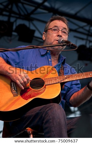 TOOWOOMBA, AUSTRALIA - MARCH 20: John Williamson plays at the \'Spirit of the Country\' flood relief country music concert on March 20, 2011 in Toowoomba, Australia.