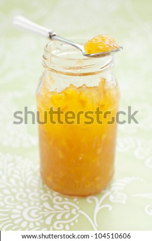 Orange marmalade in glass jar