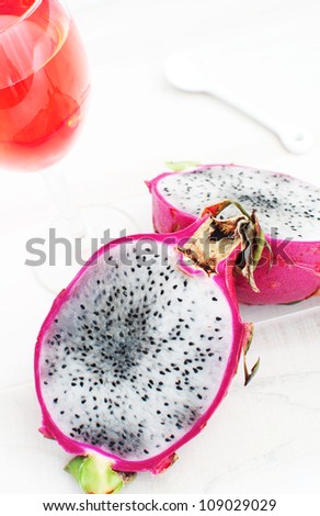 Dragon fruit cut and a beverage