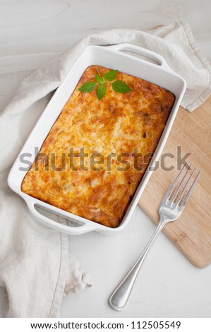Homemade gratin casserole with eggs and cheese