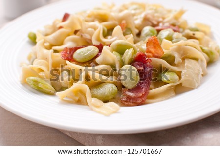 Egg Noodles with lima beans and prosciutto closeup