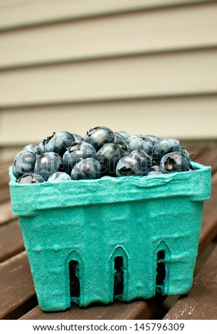 Blueberries box carton container side view