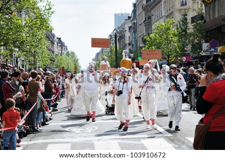 BRUSSELS, BELGIUM-MAY 19: Group of unknown participants shows their fancy costumes during Zinneke Parade on May 19, 2012 in Brussels. This parade is a biennial urban artistic and free-attendance event