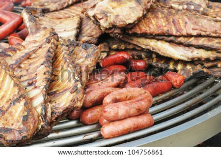 Outdoor cooking of different kinds of meat
