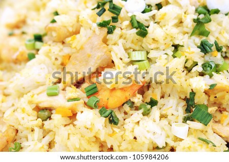 Thai street food - mixed rice, prawns, chicken and vegetables
