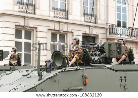 BRUSSELS, BELGIUM - JULY, 21: Belgian Army demonstrates modern equipment in Military Parade during National Day of Belgium celebrations on July 21, 2012 in Brussels, Belgium.