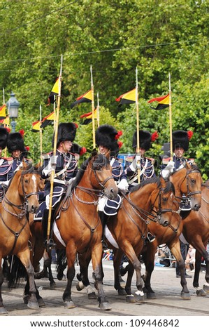 BRUSSELS, BELGIUM - JULY, 21: Belgian Cavalry moves to Place des Palais during military parade of National Day of Belgium on July 21, 2009 in Brussels, Belgium.