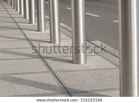 Road borders as urban background in metal tones