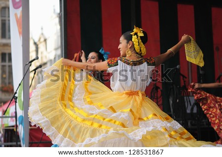 BRUSSELS, BELGIUM-SEPTEMBER 15: Dancer of Xochicalli Mexican folkloric ballet performs in concert on Grand Place during 12 edition of Folklorissimo Festival on September 15, 2012 in Brussels, Belgium.