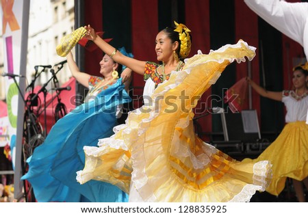BRUSSELS, BELGIUM-SEPTEMBER 15: Dancer of Xochicalli Mexican folkloric ballet performs in a concert on Grand Place during 12 edition of Folklorissimo Festival on September 15, 2012 in Brussels.
