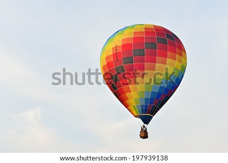 ROCHEFORT, BELGIUM-MAY 31, 2014: Hot air balloons in the sky of Walloon. Expensive sport is supported by different sponsors which place their logos on the balloons.