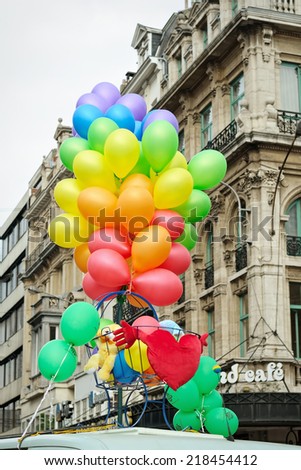 BRUSSELS, BELGIUM-MAY 15, 2010: Balloons composition in colors of Gay Pride Parade exposed in this gray day on streets during defile. This parade is annual event in Brussels