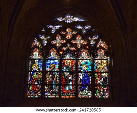 WALCOURT, BELGIUM-SEPTEMBER 28, 2014: Cathedral window in basilica Saint-Materne with image of Saint Joseph. Basilica was built in 11 century and it is a home of statue of Black Madonna of Walcourt