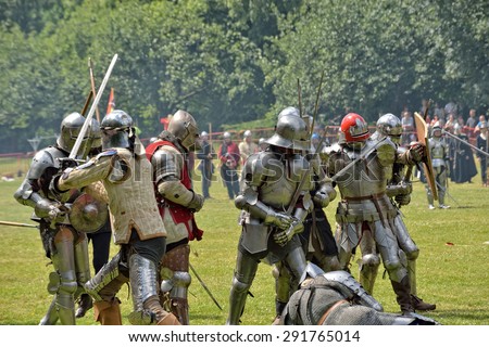 DEURNE, BELGIUM-JUNE 13, 2015: Reconstruction of medieval battle of 1477 near Antwerp during Fete Medievale in Deurne