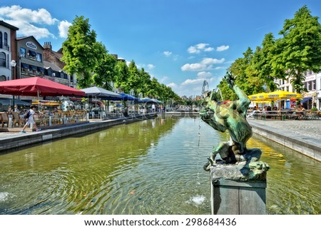 BRUSSELS, BELGIUM-JUNE 06, 2013: Place Saint Catherine, which was built on place of the old port. This square is a favorite place for tourists searching Belgian sea food restaurants