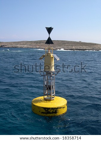 Navigation buoy in the sea between maltese islands Comino and Gozo