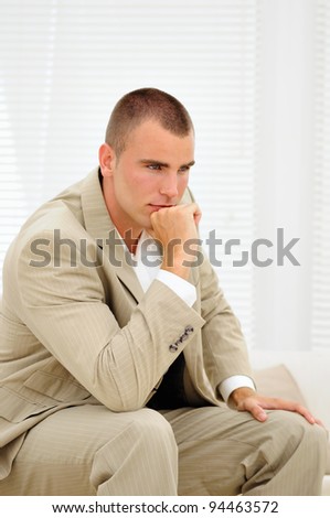 Young job seeker thinking about mistakes in his interview