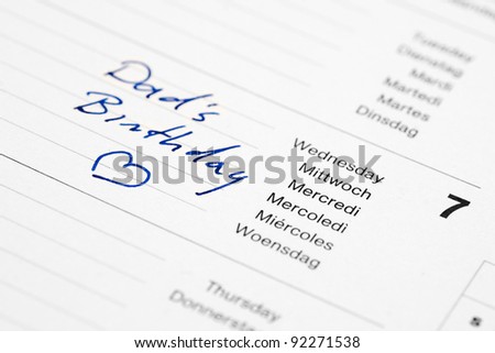 Dad\'s birthday reminding note in calendar. Selective focus image.