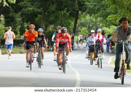 BANGKOK THAILAND -September 15- group of bikers are riding bikes in bicycle lanes of at the Vachirabenjatas Park (Rot Fai park) of Bangkok on September 15 ,2014 in Bangkok, Thailand