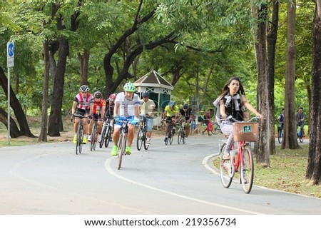 BANGKOK THAILAND -September 24- group of bikers are riding bikes in bicycle lanes of at the Vachirabenjatas Park (Rot Fai park) of Bangkok on September 24 ,2014 in Bangkok, Thailand