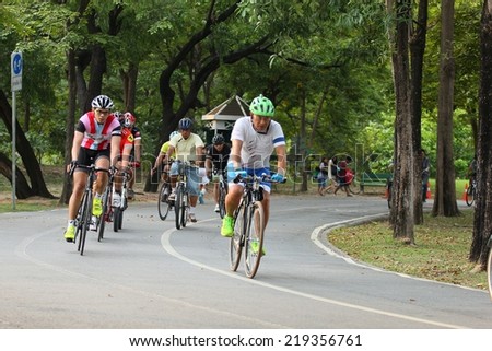 BANGKOK THAILAND -September 24- group of bikers are riding bikes in bicycle lanes of at the Vachirabenjatas Park (Rot Fai park) of Bangkok on September 24 ,2014 in Bangkok, Thailand