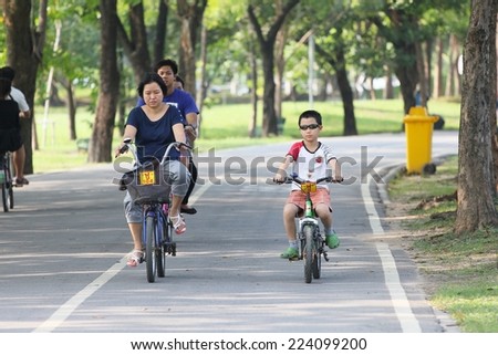 BANGKOK THAILAND -Oct. 14- group of bikers are riding bikes in bicycle lanes of at the Vachirabenjatas Park (Rot Fai park) of Bangkok on October 14 ,2014 in Bangkok, Thailand