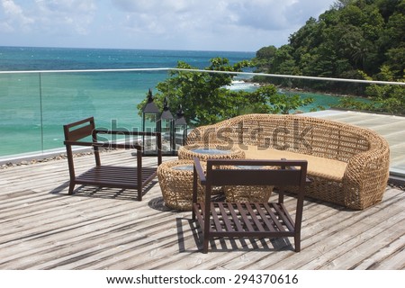 Rattan sofa with the sea view in a luxury resort