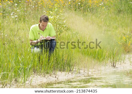 Environmental scientist researching the environment and natural diversity