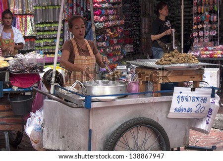 BANGKOK, THAILAND - SEPT 17: A street vendor in Chinatown on September 17th 2012. Authorities are seeking cooperation  of vendors operating illegally instead of arrests and fines.
