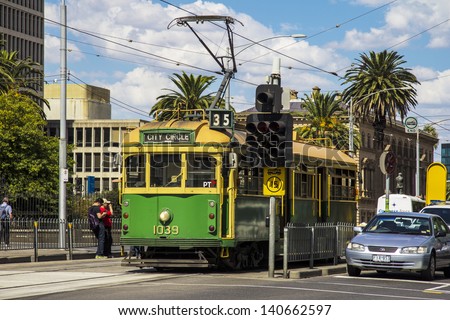 MELBOURNE, AUSTRALIA - MAR 20TH: A city circle tram waits at a stop light on March 20th 2013. The tram line is a free service that runs through the Central Business District.