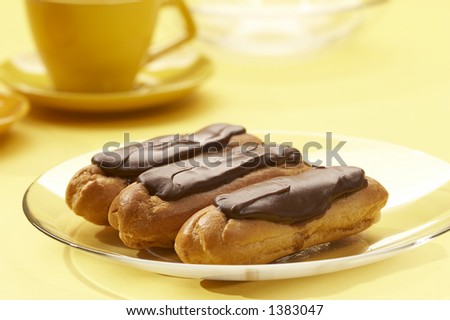three pastry filled with custard for dessert