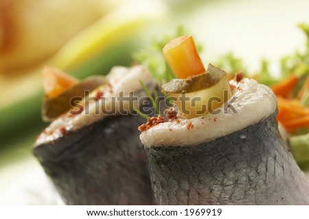 macro picture of fillet herring with vegetables