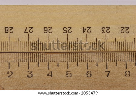 macro picture of two together wooden rulers