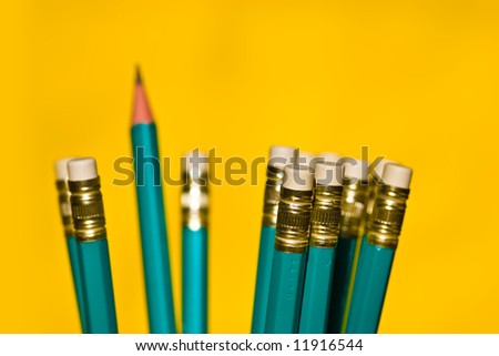 stationery series: pencils with eraser over yellow background