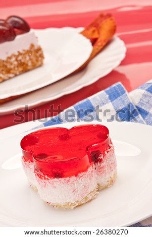 food serie: sweet fancy cake with cranberry jelly