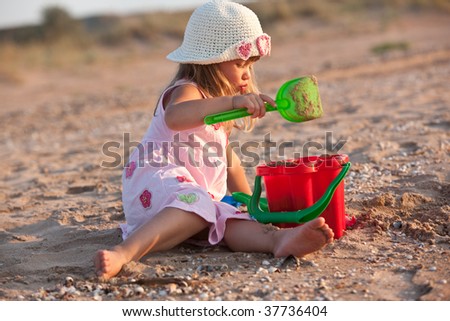 people series: little girl are play the game with sand