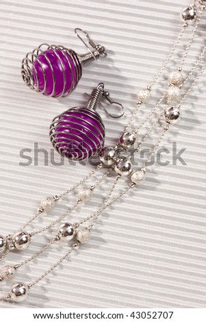 fashion object: female accessories, beads and ear-ring