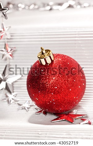 Holiday series: christmas red ball over white