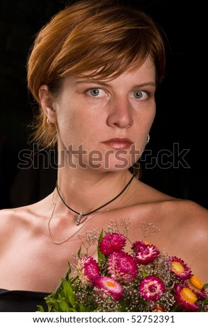 people series: young woman with flower over black