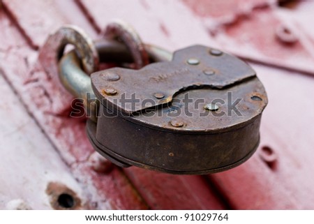 security series: old styled padlock on the door