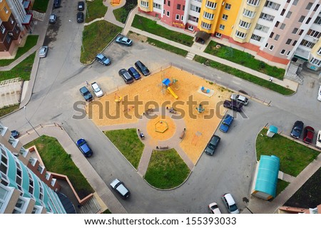 The inner courtyard of an apartment building in the city, the view from above