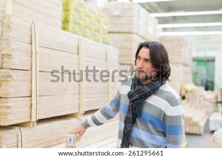 Portrait of a middle-aged man in a store building materials