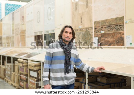 Portrait of a middle-aged man in a store building materials