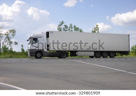 LIPETSK, RUSSIA - 29.05. 2015 White Renault semi-trailer truck at interurban road